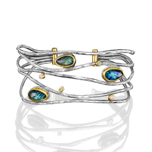 Montana Sapphires Surrounded in a Halo of Gold Cuff Bracelet